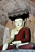 Bagan Myanmar. Sulamani temple. The heavenly restored main Buddha image of the eastern hall. 